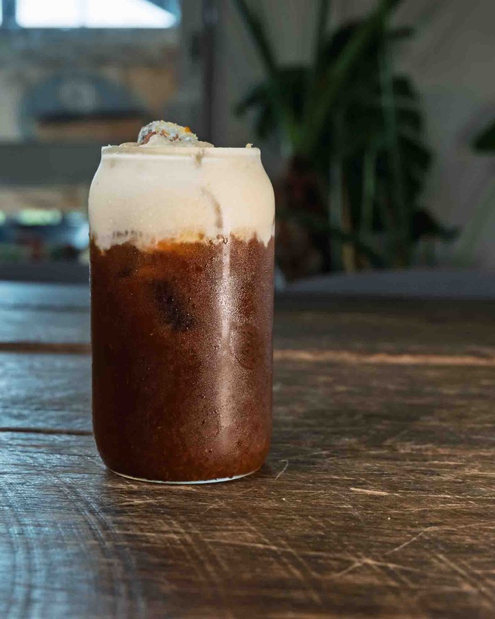 Our Mont Blanc cold brew with its creamy topping, photographed at First Fruits Coffee